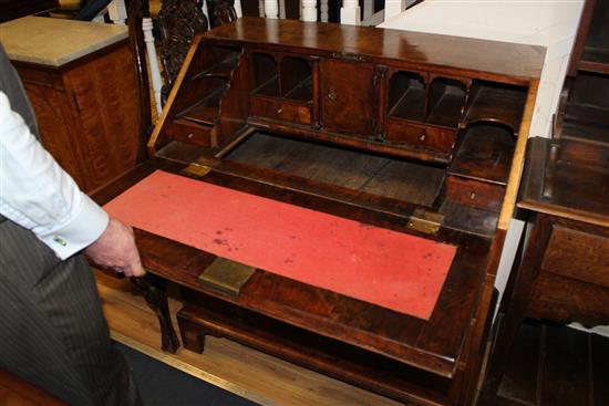 An early 18th century walnut and featherbanded bureau, W.3ft